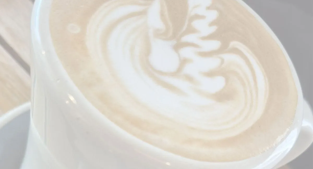 Mum enjoying quiet morning coffee after learning how to stop baby waking early